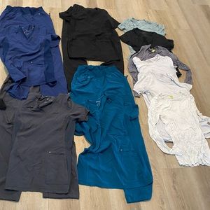 Scrubs lot. 4 pairs of scrubs and 7 undershirts.